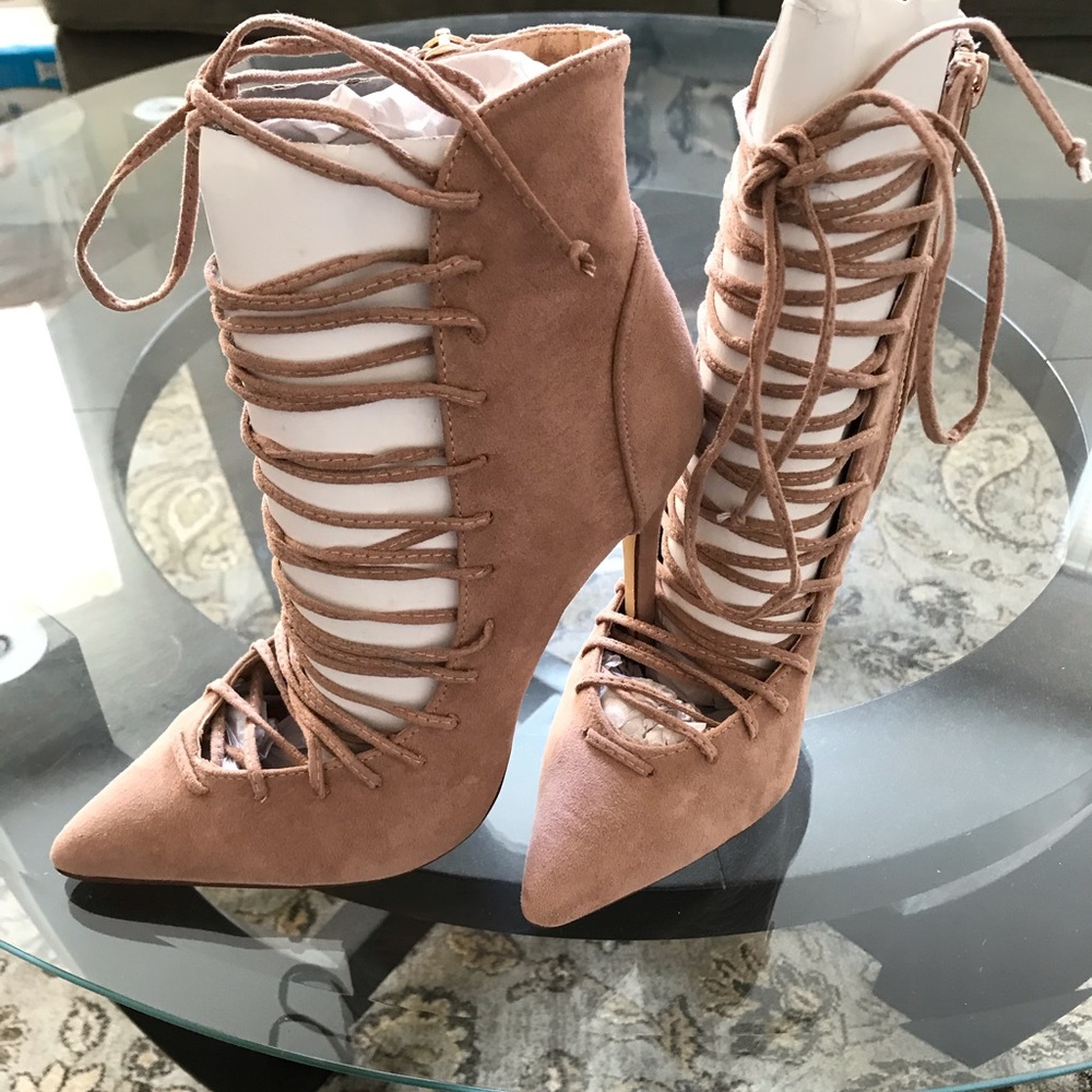 Mauve colored lace up booties